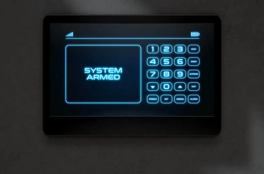 A 3D render of a modern touch screen interactive home security keypad access panel with an illuminated digital numeric keypad and words that read system armed